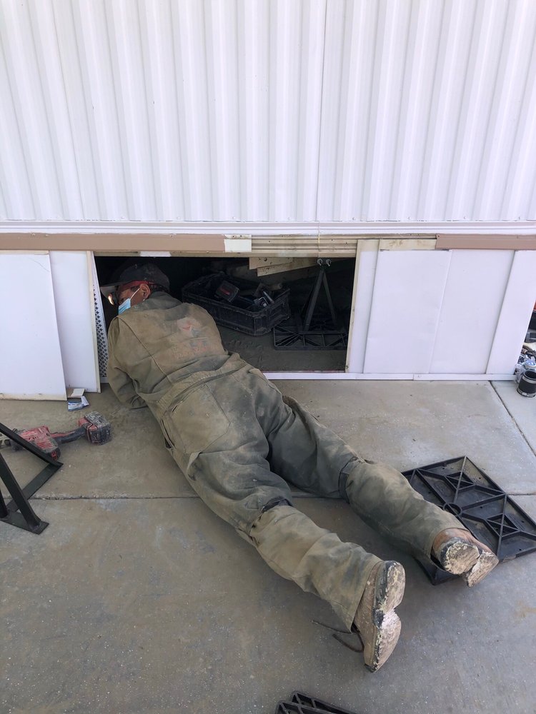 Cal Star technician inspecting a mobile home during an on-site visit